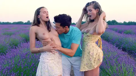 A duo of ash-blonde ladies have a three way with a youngster