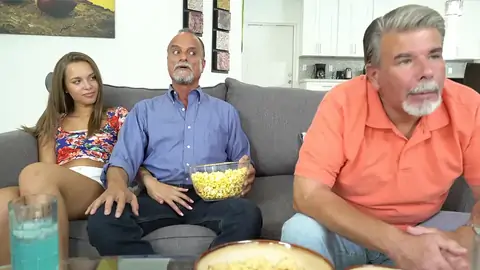 Nubile taunts astonished father's mate by caressing his pecker