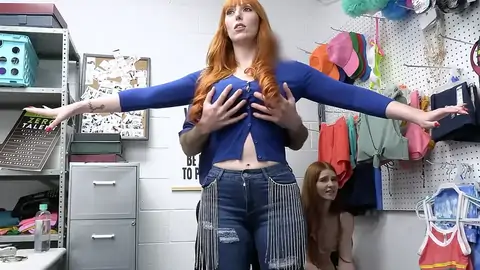 two redheads are having an FFM trio-way with the officer