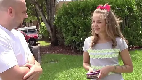 Ash-blonde teenager with smallish cupcakes talking to a hairless man