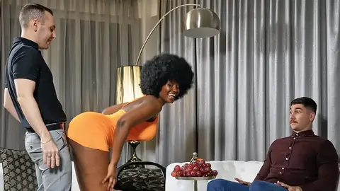 Dark-hued beauty on her knees gives husband's chief a deep throat